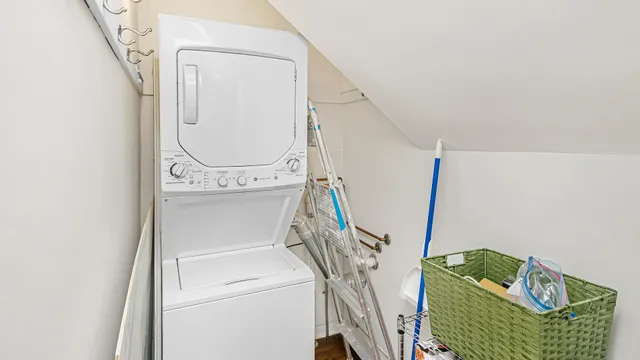 a utility room with a window dryer and washer