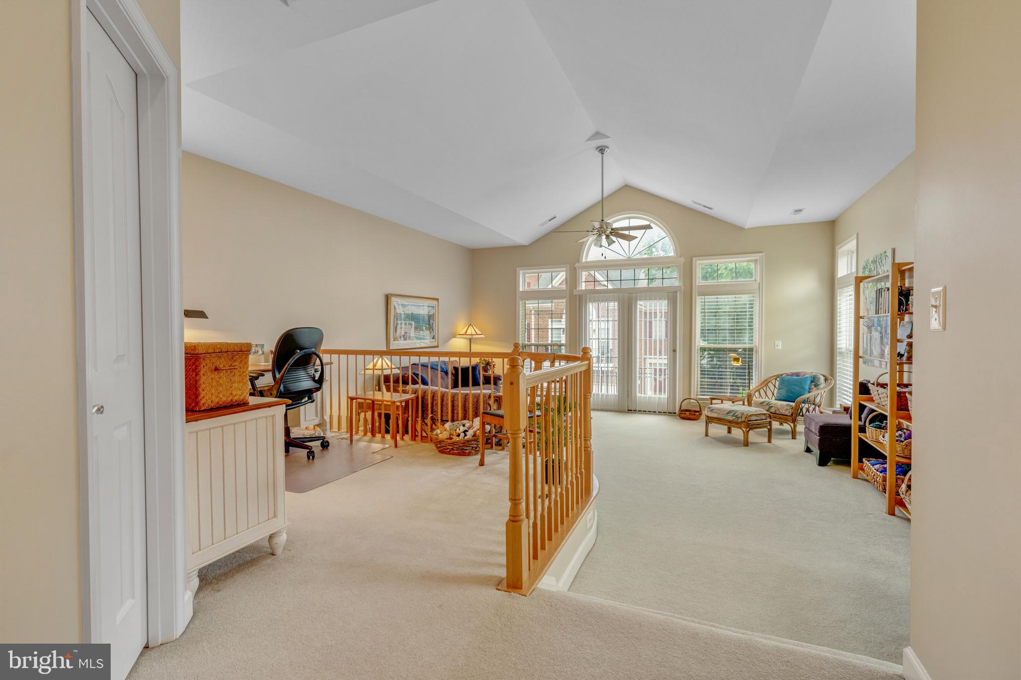 1925 Logan Manor Drive Reston, VA 20190 - Photo 20 of 61 a view of a livingroom with furniture and a large window