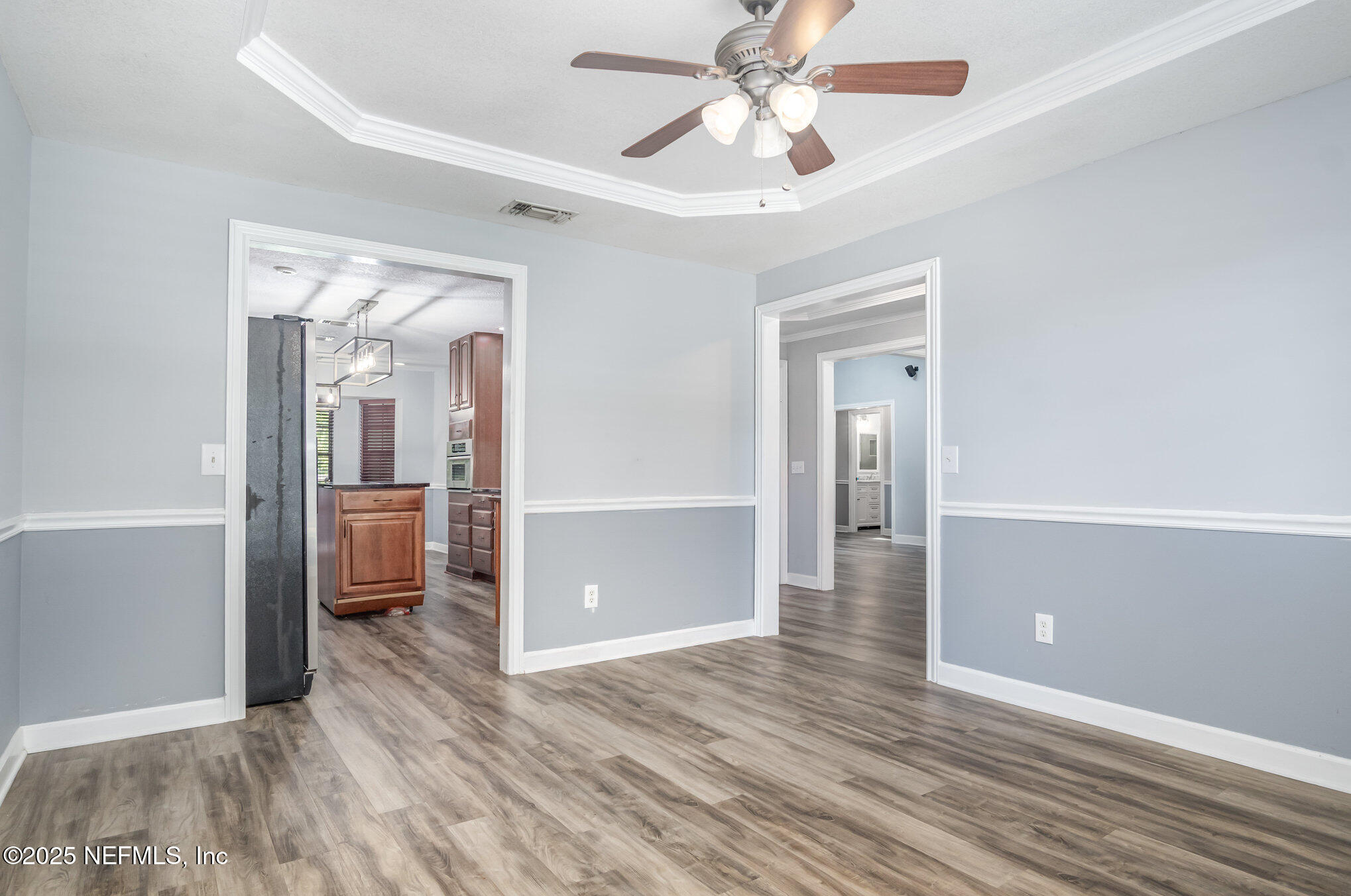 12046 Acornshell Way Jacksonville, FL 32223 - Photo 5 of 28 wooden floor in an empty room