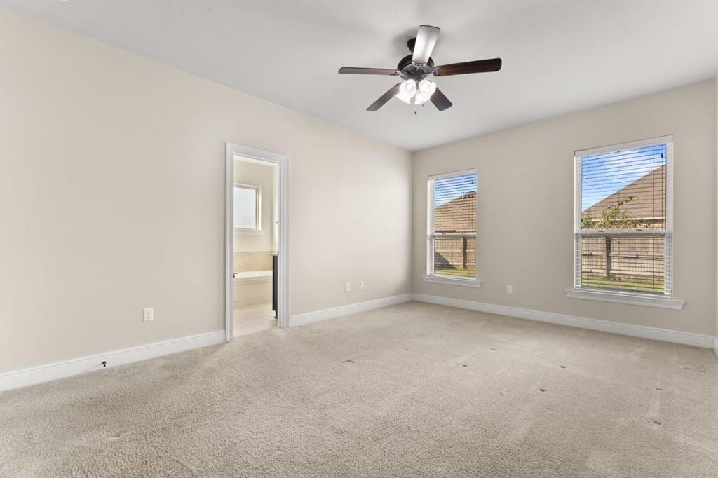 1923 Thibodeaux Road Lake Charles, LA 70607 - Photo 13 of 29 Master Bedroom. Two windows overlooking privacy fenced back yard.