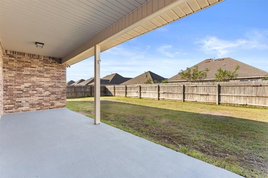 1923 Thibodeaux Road Lake Charles, LA 70607 - Photo 25 of 29 Back Patio with partial view of back yard.