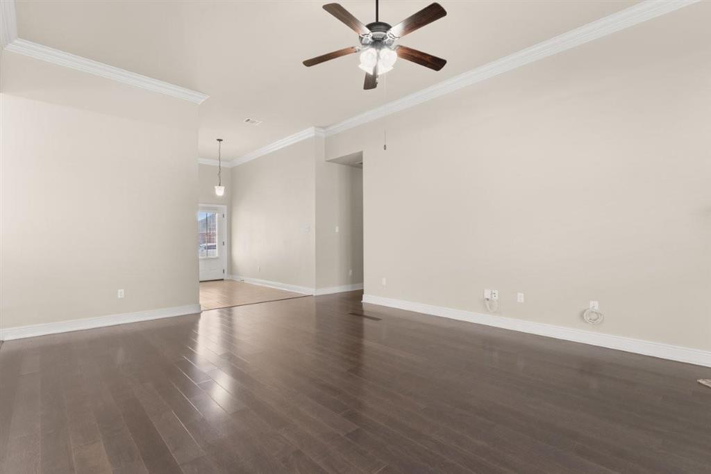 1923 Thibodeaux Road Lake Charles, LA 70607 - Photo 3 of 29 View of Living area looking from kitchen toward front foyer/front door entrance.