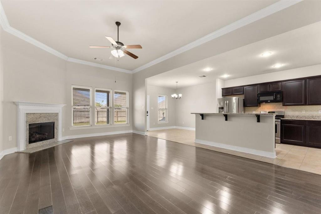 1923 Thibodeaux Road Lake Charles, LA 70607 - Photo 29 of 29 Another view of Open Floor Plan - Living/Dining/Kitchen. Gas fireplace shown in lefthand corner.