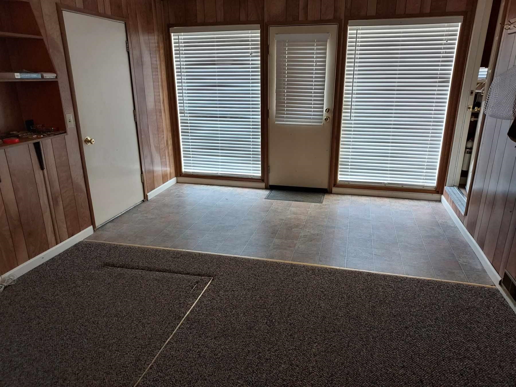 59 Dry Canyon Road Coleville, CA 96107 - Photo 9 of 17 Kitchen with white fridge with ice dispenser, a ceiling fan, a peninsula, stone finish flooring, and light countertops
