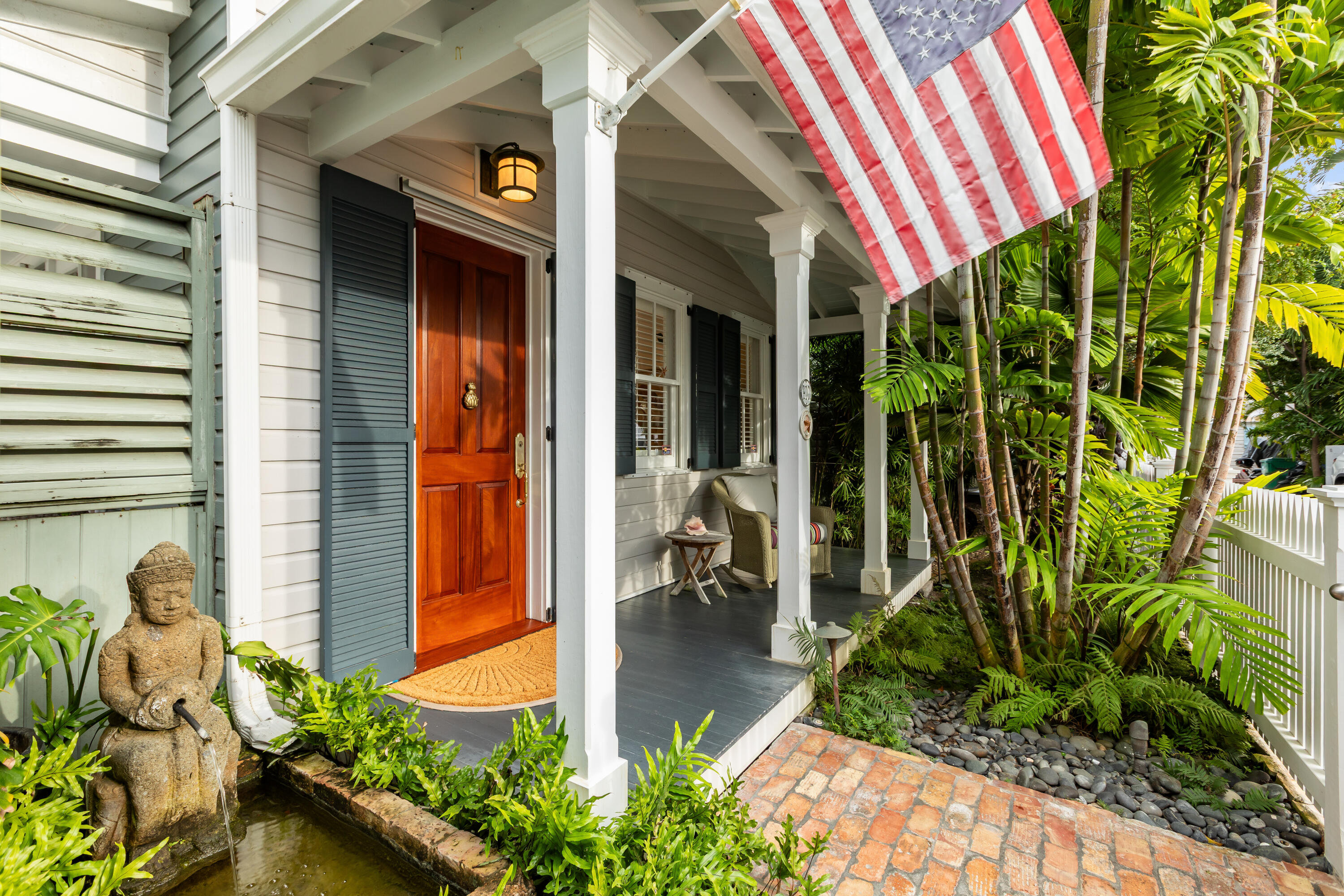 910-914 Watson Street Key West, FL 33040 - Photo 12 of 38 a front view of a house with a yard