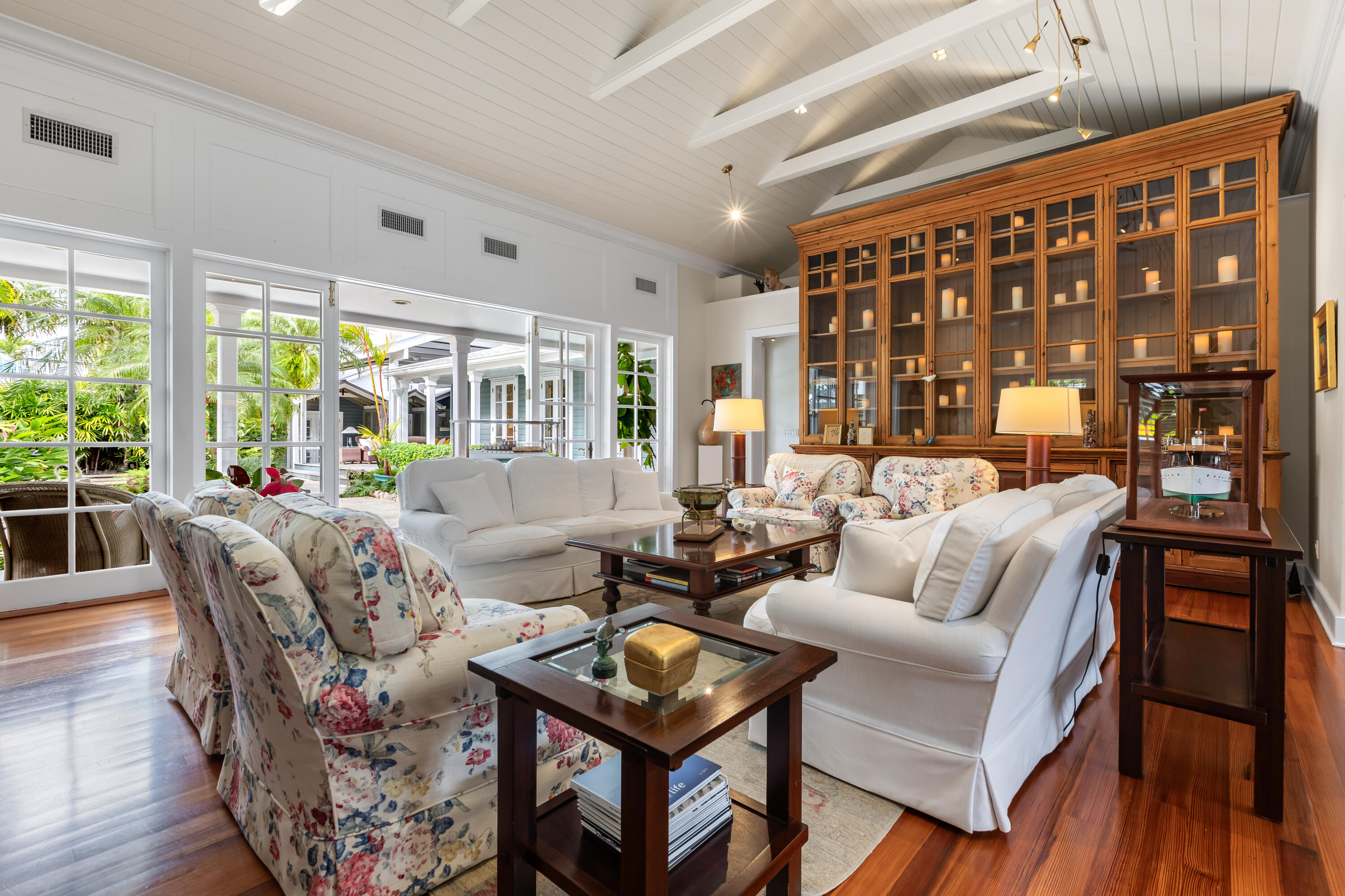 910-914 Watson Street Key West, FL 33040 - Photo 13 of 38 a living room with furniture and a floor to ceiling window