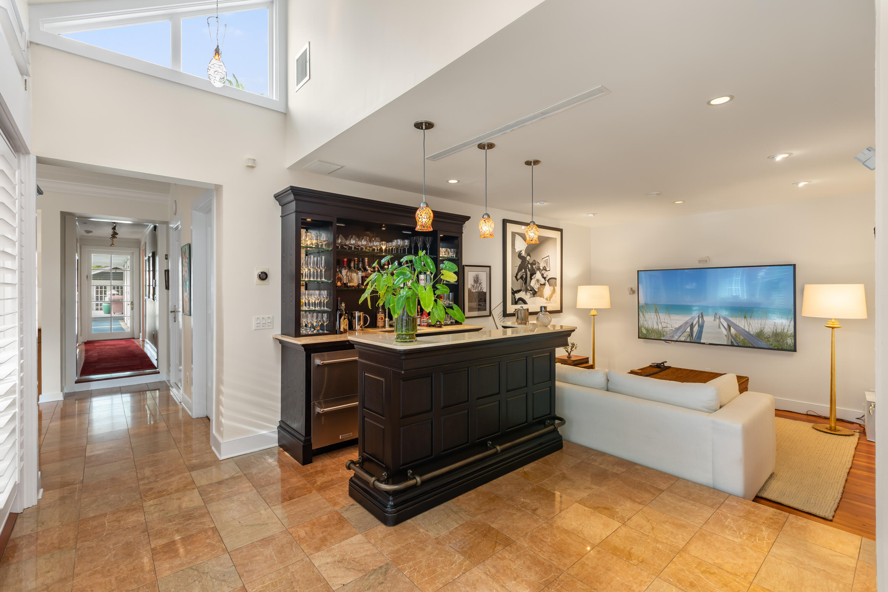 910-914 Watson Street Key West, FL 33040 - Photo 20 of 38 a living room with furniture and a flat screen tv