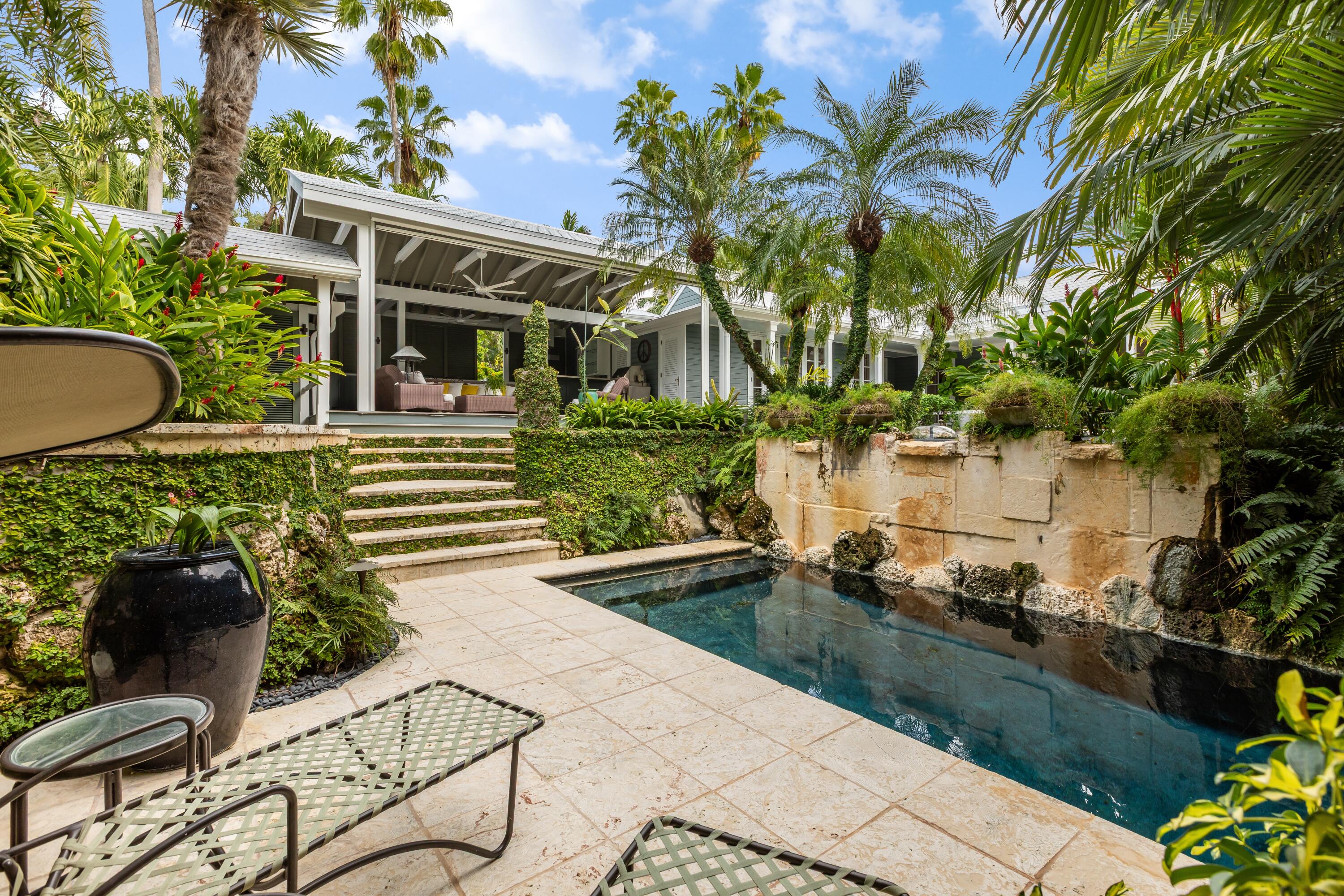 910-914 Watson Street Key West, FL 33040 - Photo 2 of 38 a view of a house with backyard and sitting area
