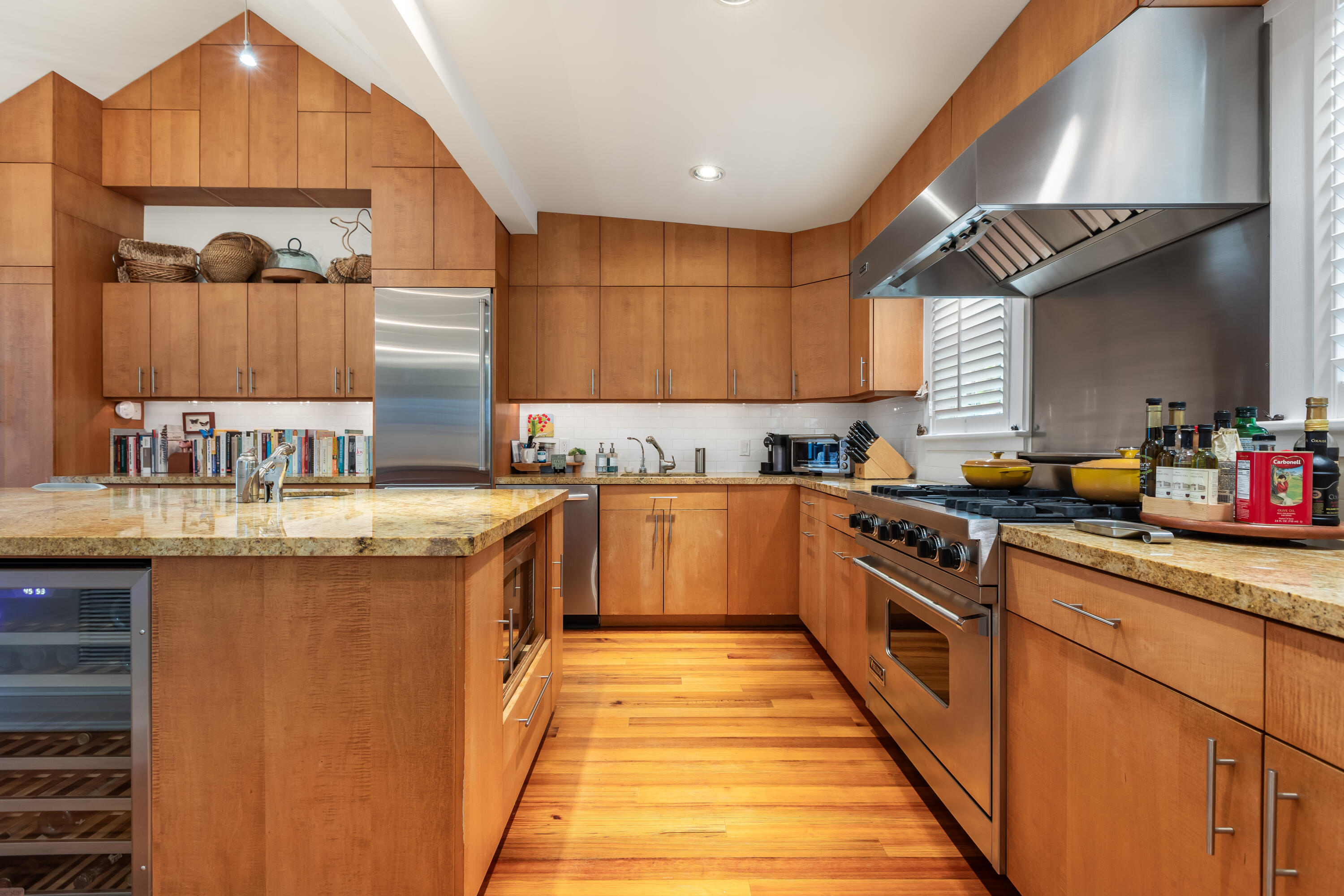 910-914 Watson Street Key West, FL 33040 - Photo 25 of 38 a kitchen with stainless steel appliances granite countertop a sink and cabinets
