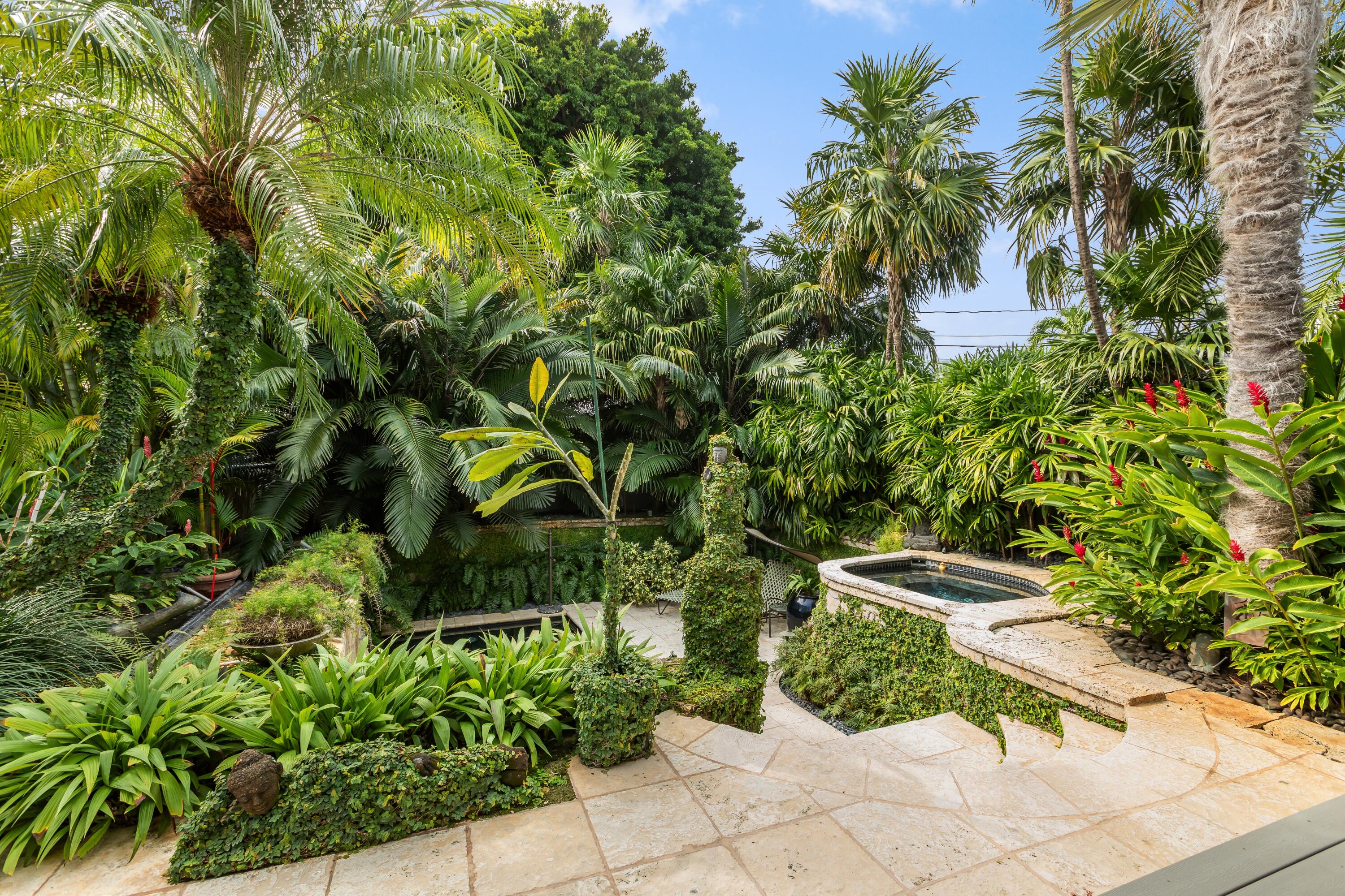 910-914 Watson Street Key West, FL 33040 - Photo 4 of 38 a view of a garden with plants and trees