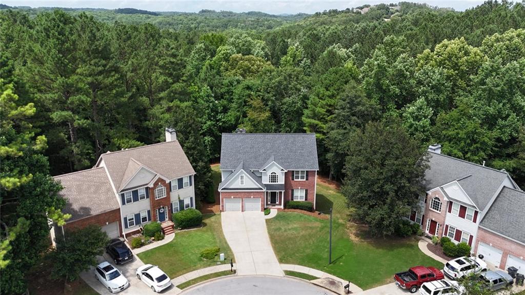 43 Ivy Mist Lane Acworth, GA 30101 - Photo 41 of 58 an aerial view of residential houses with outdoor space and trees all around