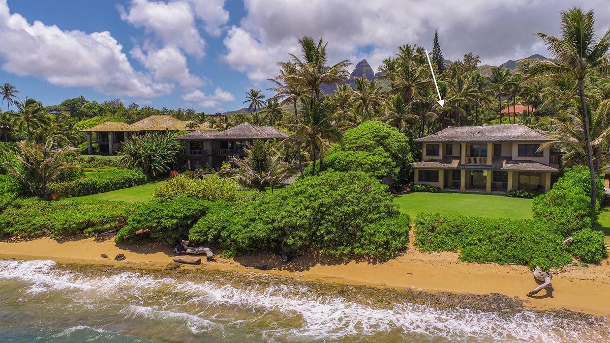 5070 Kukuna Road Kilauea, HI 96754 - Photo 2 of 30 a view of a house with a yard and potted plants