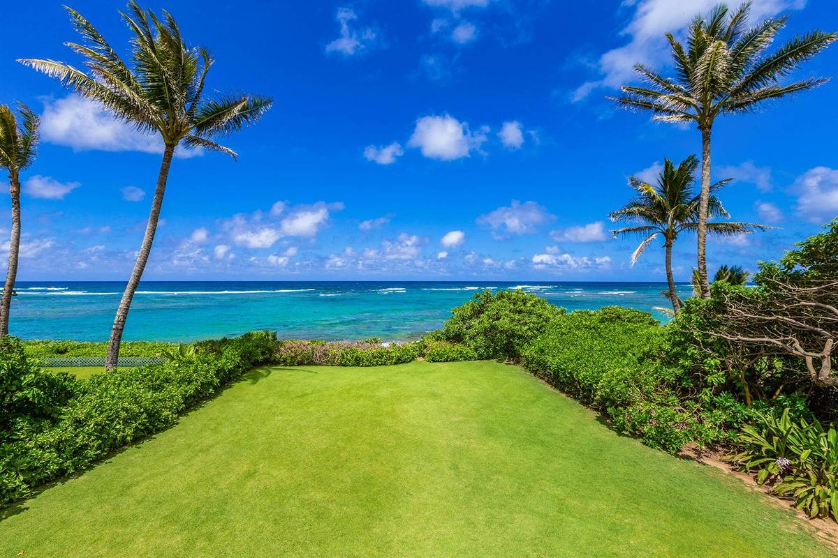5070 Kukuna Road Kilauea, HI 96754 - Photo 27 of 30 a view of a garden with a house