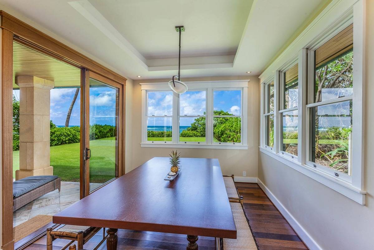 5070 Kukuna Road Kilauea, HI 96754 - Photo 9 of 30 a view of a dining room with furniture window and wooden floor