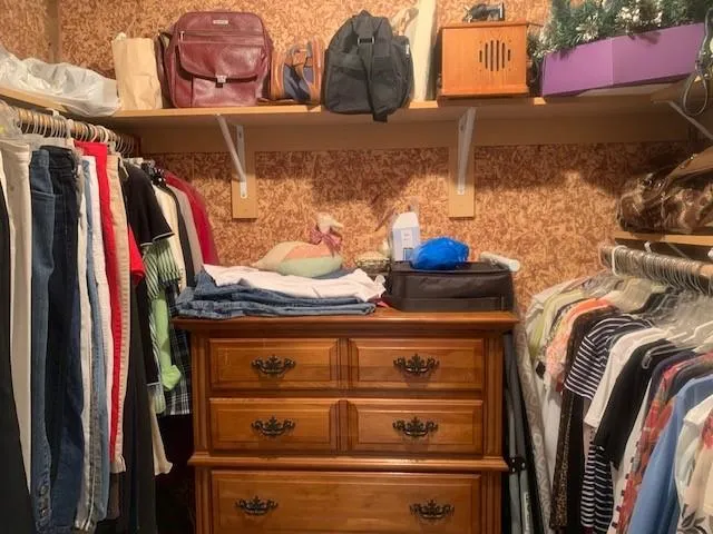 a bathroom with a bathtub and a toilet