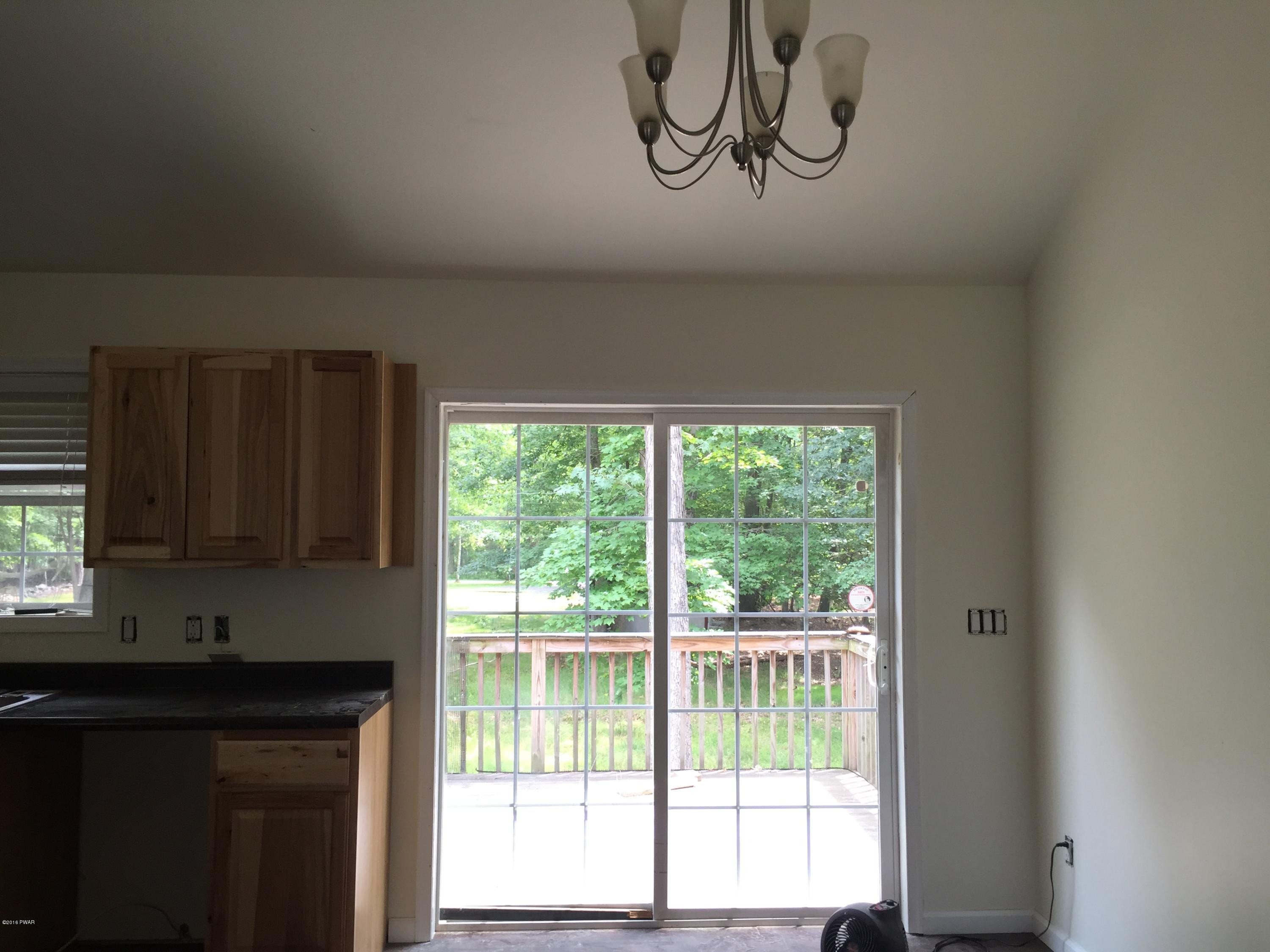 158 Yale Road Milford, PA 18337 - Photo 6 of 13 a kitchen with a window a sink and a window