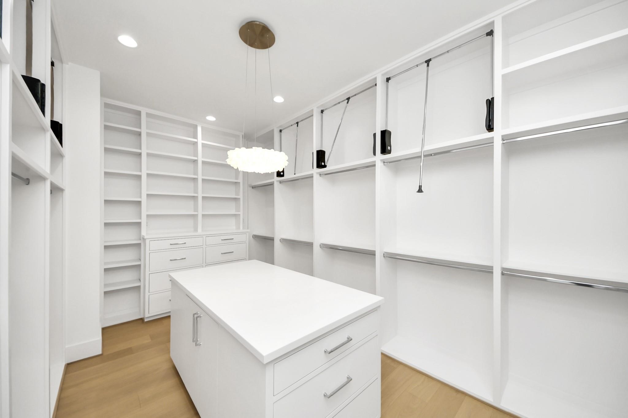 2232 Swift Boulevard Houston, TX 77030 - Photo 26 of 46 Spacious walk-in closet with built-in storage.