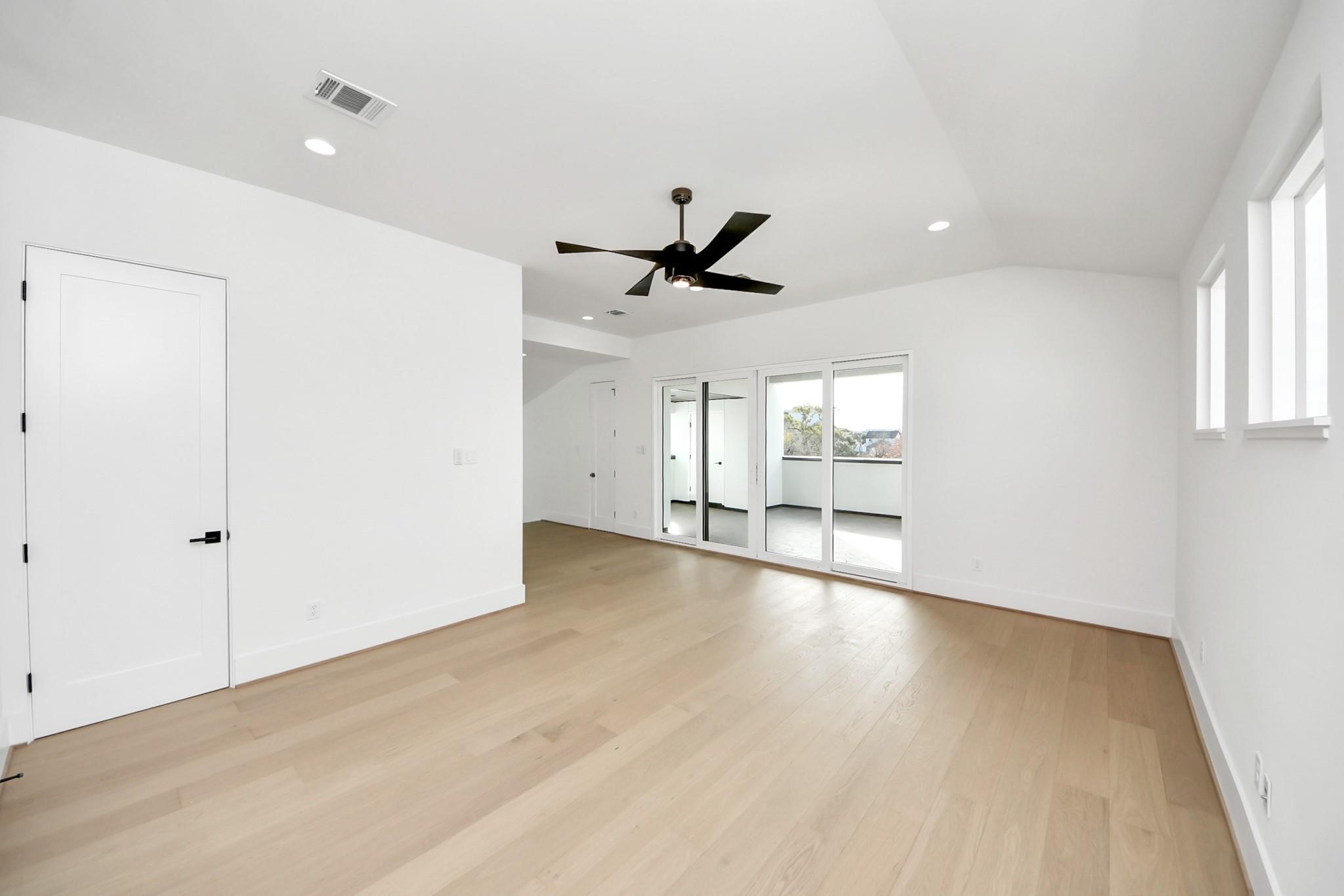 2232 Swift Boulevard Houston, TX 77030 - Photo 38 of 46 Third-floor game room with wet bar and direct access to rooftop terrace.