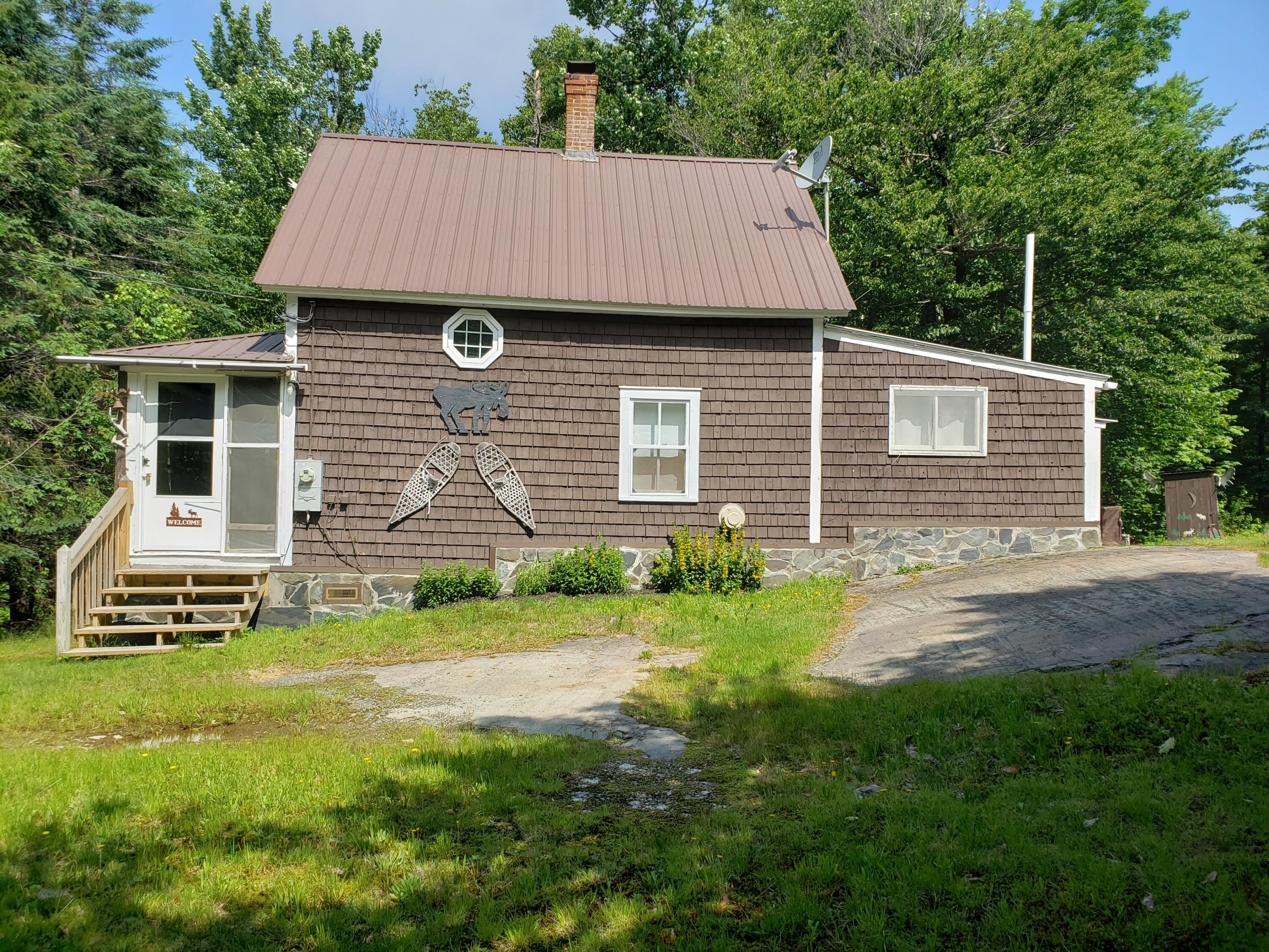 224 E Road Greenville, ME 04441 - Photo 2 of 30 View Right Side Camp
