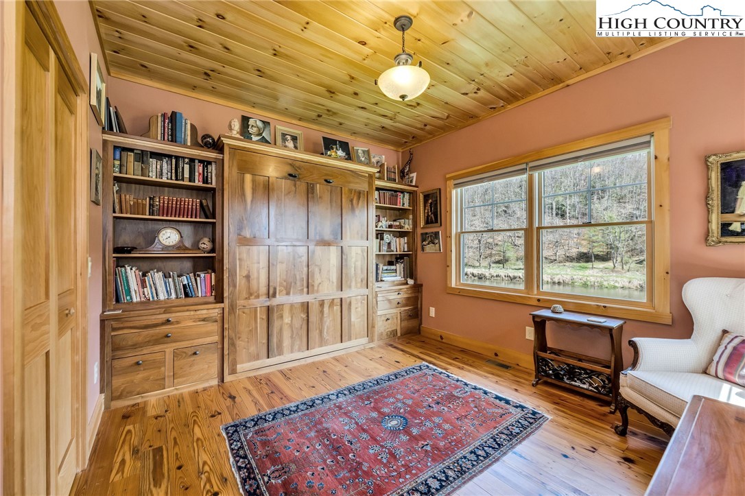 1976 Hartzog Ford Road West Jefferson, NC 28694 - Photo 11 of 50 a living room with furniture and a rug