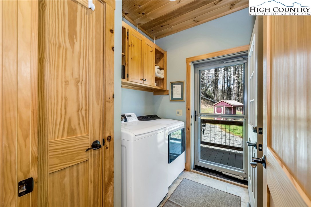 1976 Hartzog Ford Road West Jefferson, NC 28694 - Photo 15 of 50 a utility room with dryer and washer