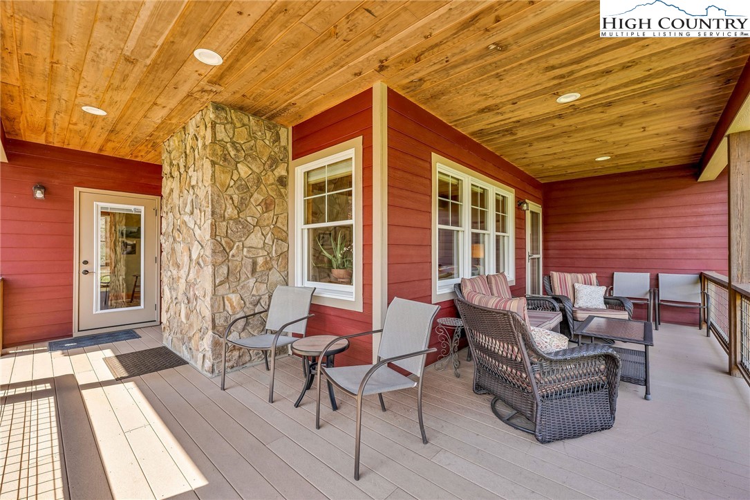 1976 Hartzog Ford Road West Jefferson, NC 28694 - Photo 38 of 50 a outdoor living space with furniture and a couch