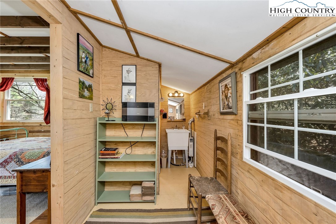 1976 Hartzog Ford Road West Jefferson, NC 28694 - Photo 46 of 50 a view of walk in closet with empty racks