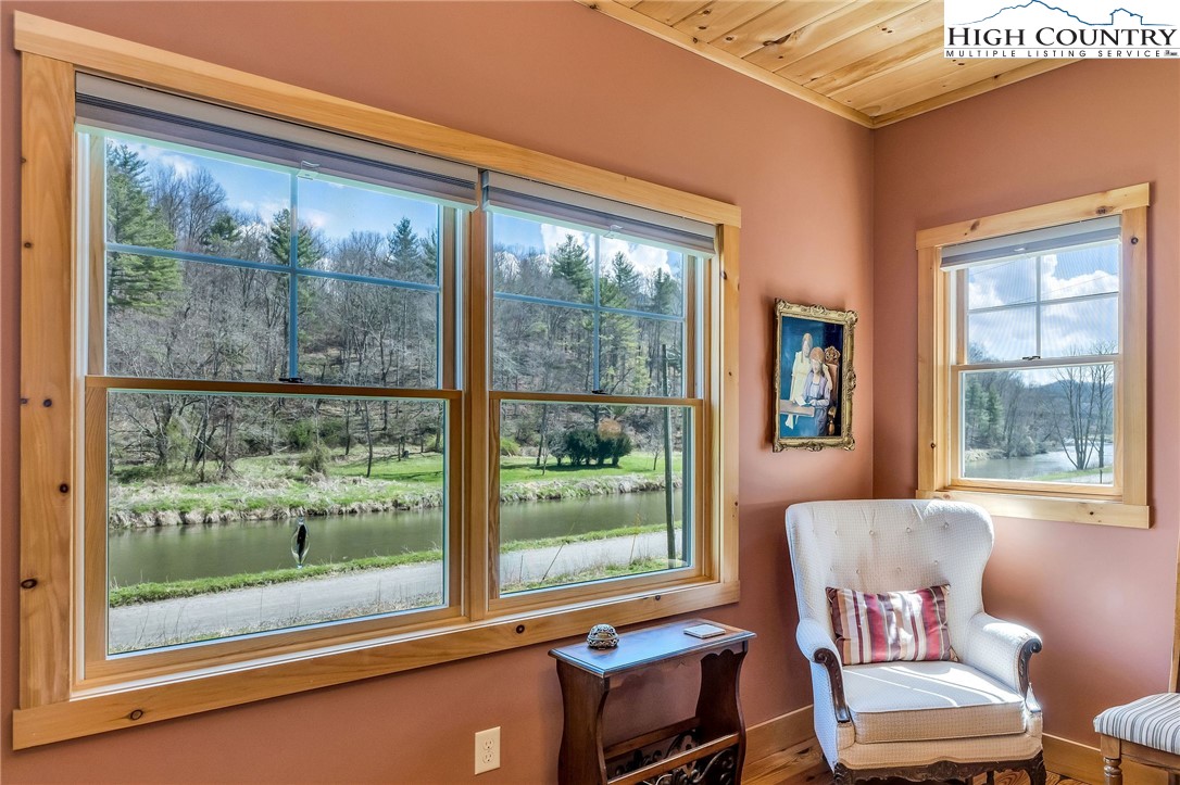 1976 Hartzog Ford Road West Jefferson, NC 28694 - Photo 10 of 50 a living room with furniture and a window