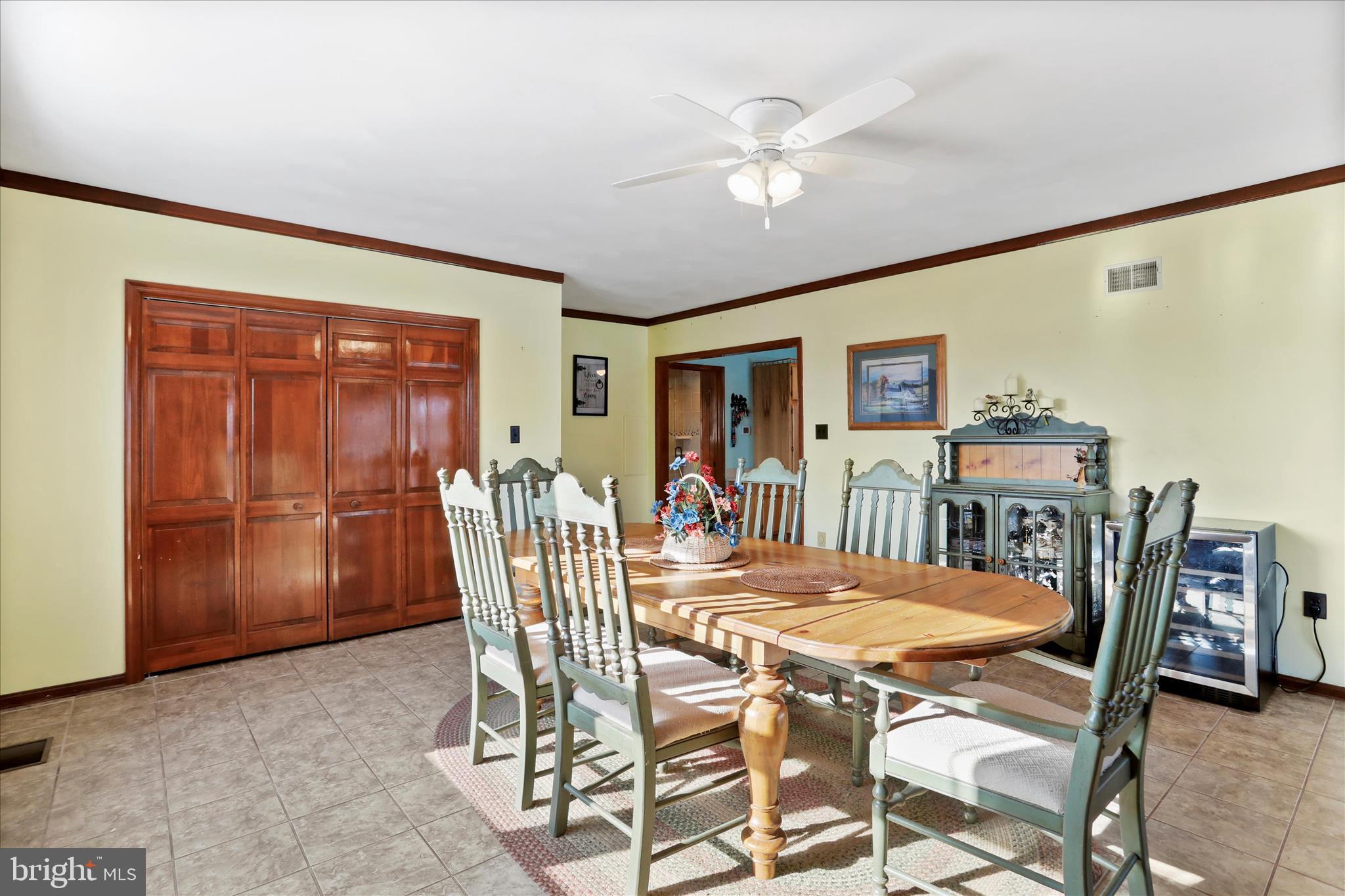 14507 Heavenly Acres Ridge Hancock, MD 21750 - Photo 15 of 70 a dining room with furniture a chandelier and wooden floor