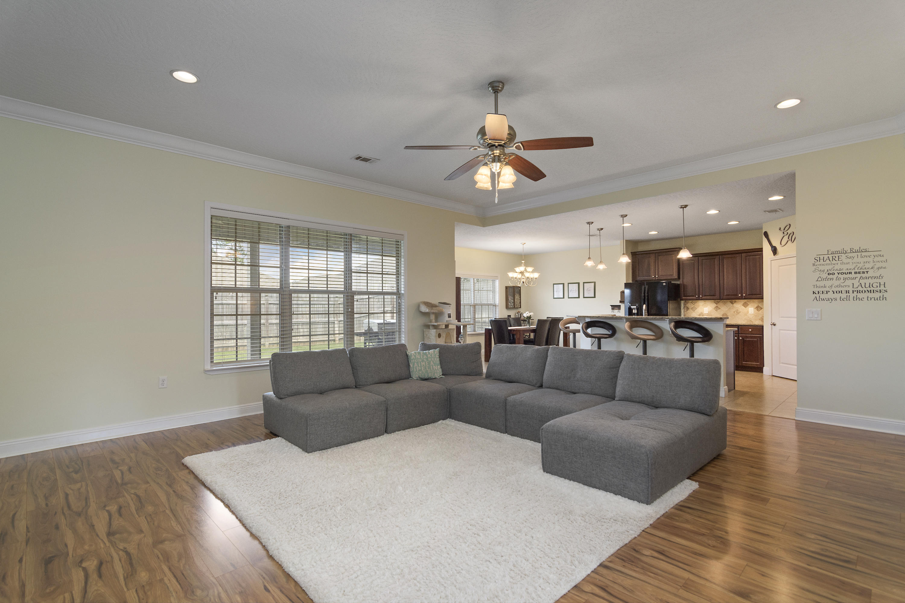 4605 Hermosa Road Crestview, FL 32539 - Photo 13 of 46 a living room with furniture and a large window