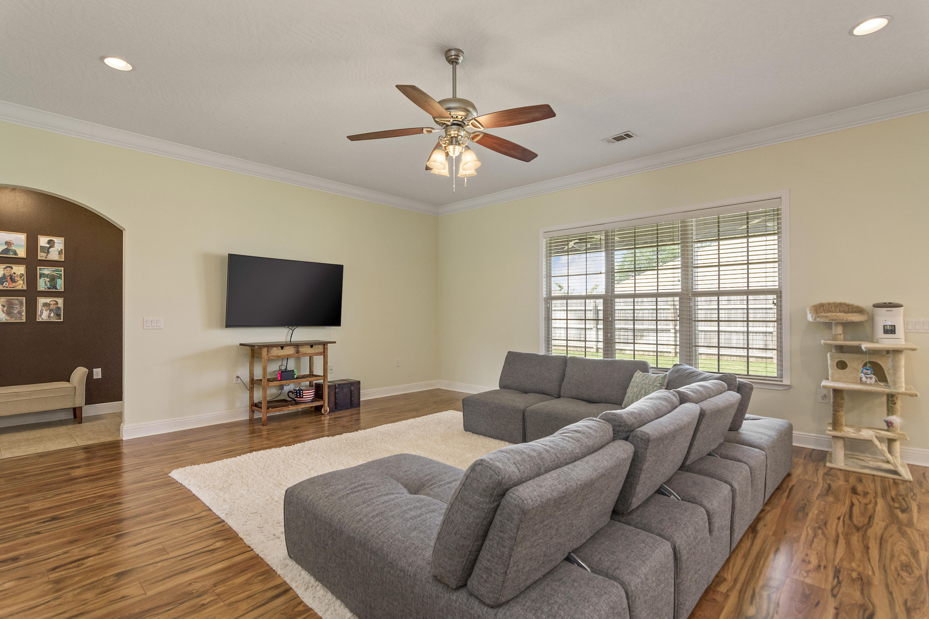 4605 Hermosa Road Crestview, FL 32539 - Photo 14 of 46 a living room with furniture and a flat screen tv