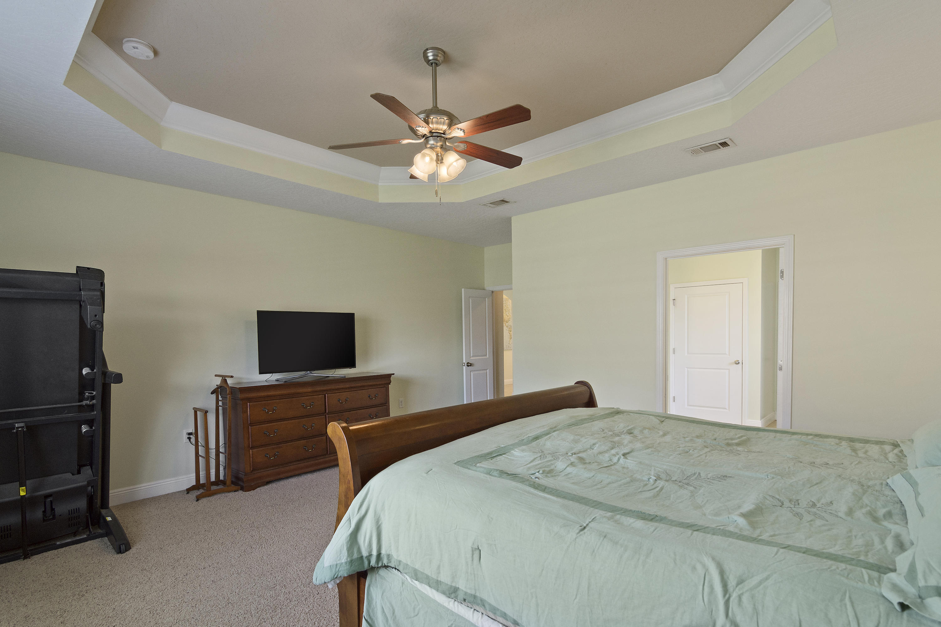 4605 Hermosa Road Crestview, FL 32539 - Photo 25 of 46 a bedroom with a bed and a flat screen tv
