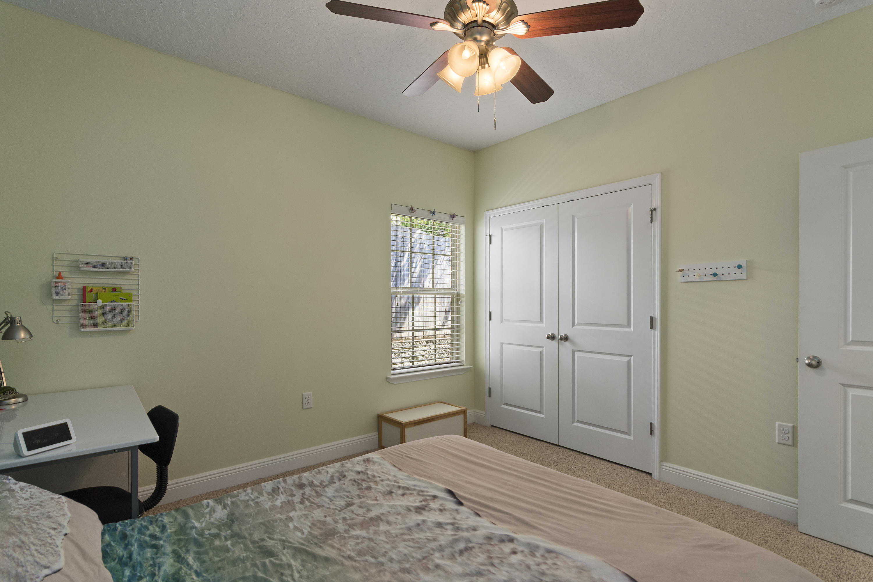 4605 Hermosa Road Crestview, FL 32539 - Photo 31 of 46 a view of a livingroom with a chandelier fan and a window