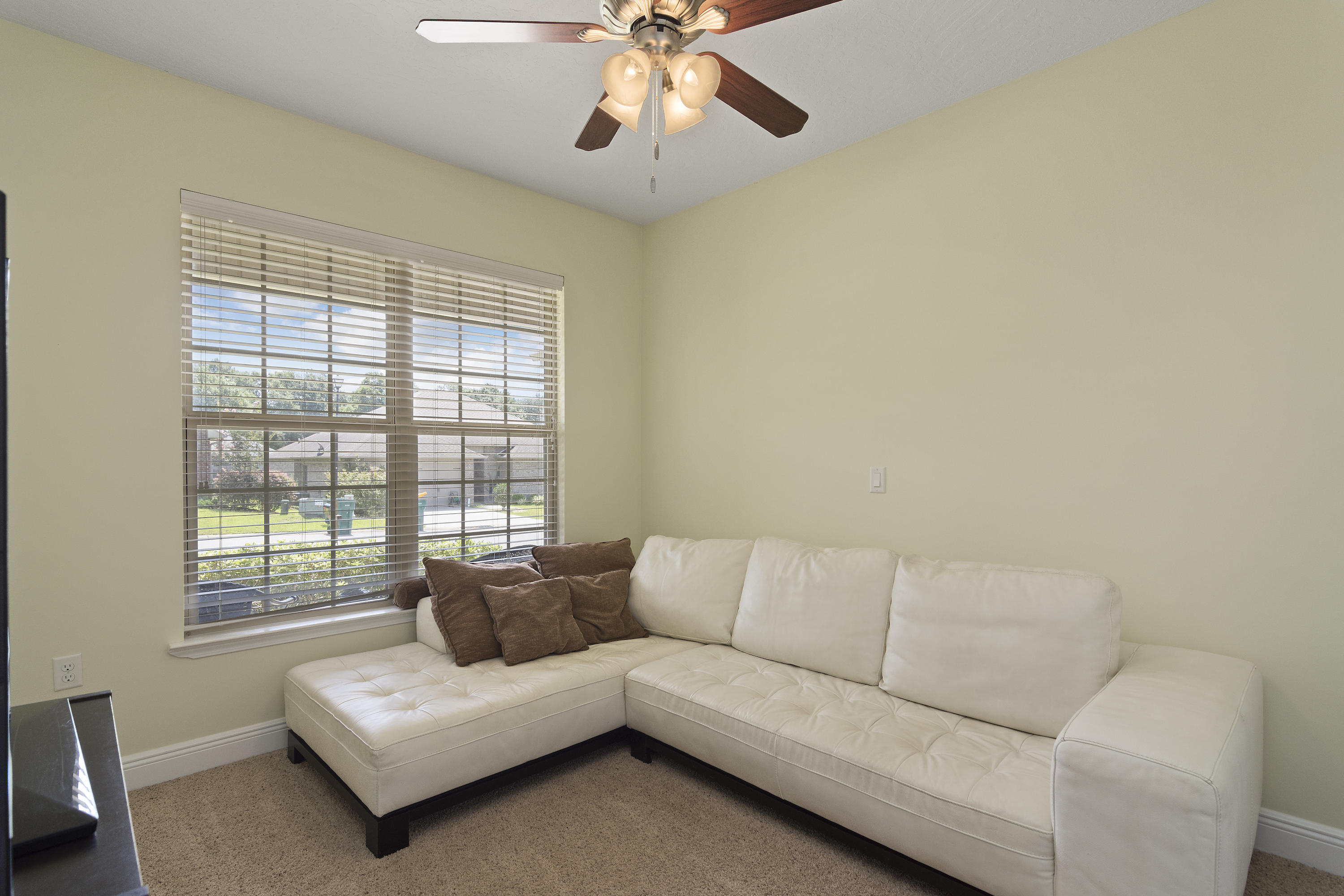 4605 Hermosa Road Crestview, FL 32539 - Photo 32 of 46 a living room with furniture and a window