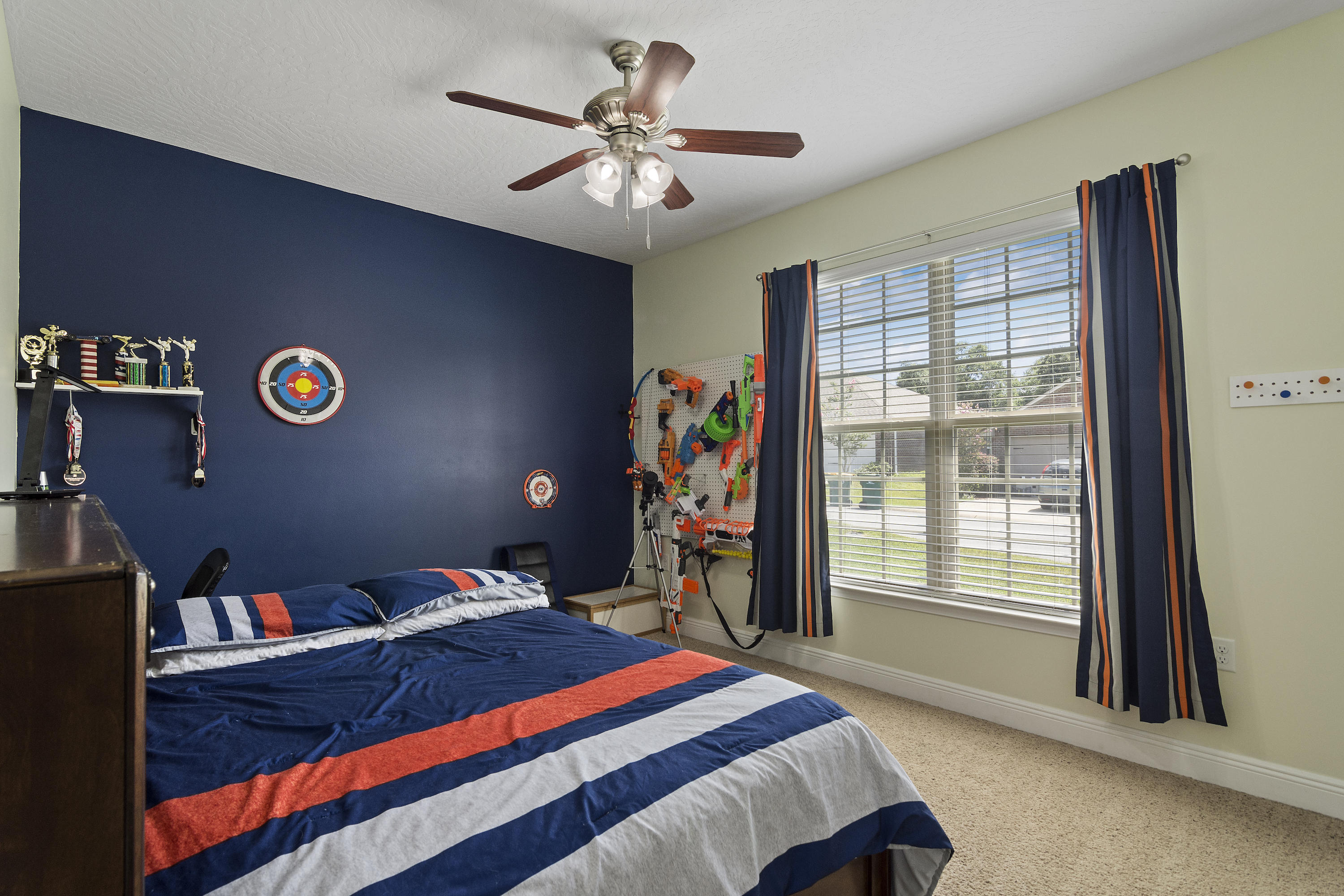 4605 Hermosa Road Crestview, FL 32539 - Photo 33 of 46 a bed room with a bed and a large window