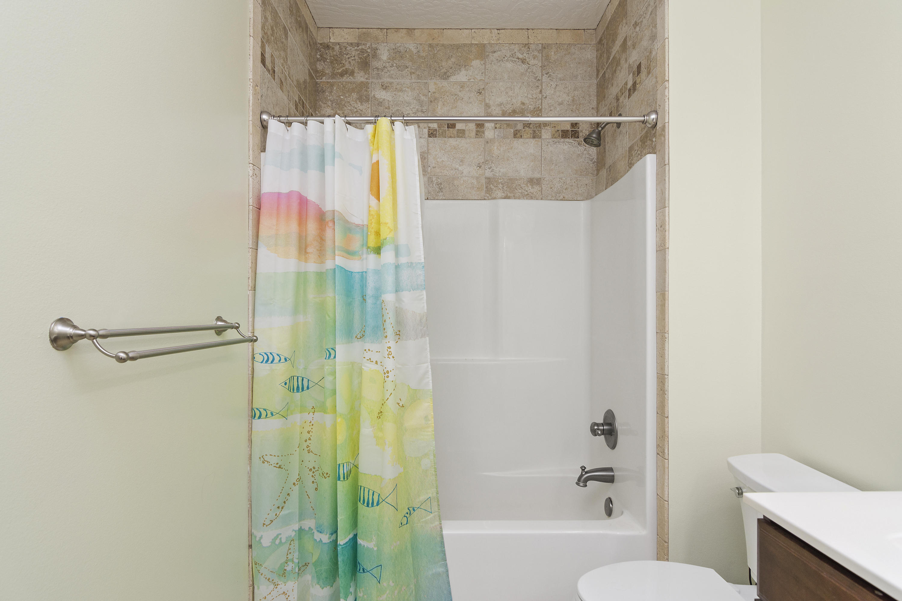 4605 Hermosa Road Crestview, FL 32539 - Photo 36 of 46 a bathroom with a shower and a toilet