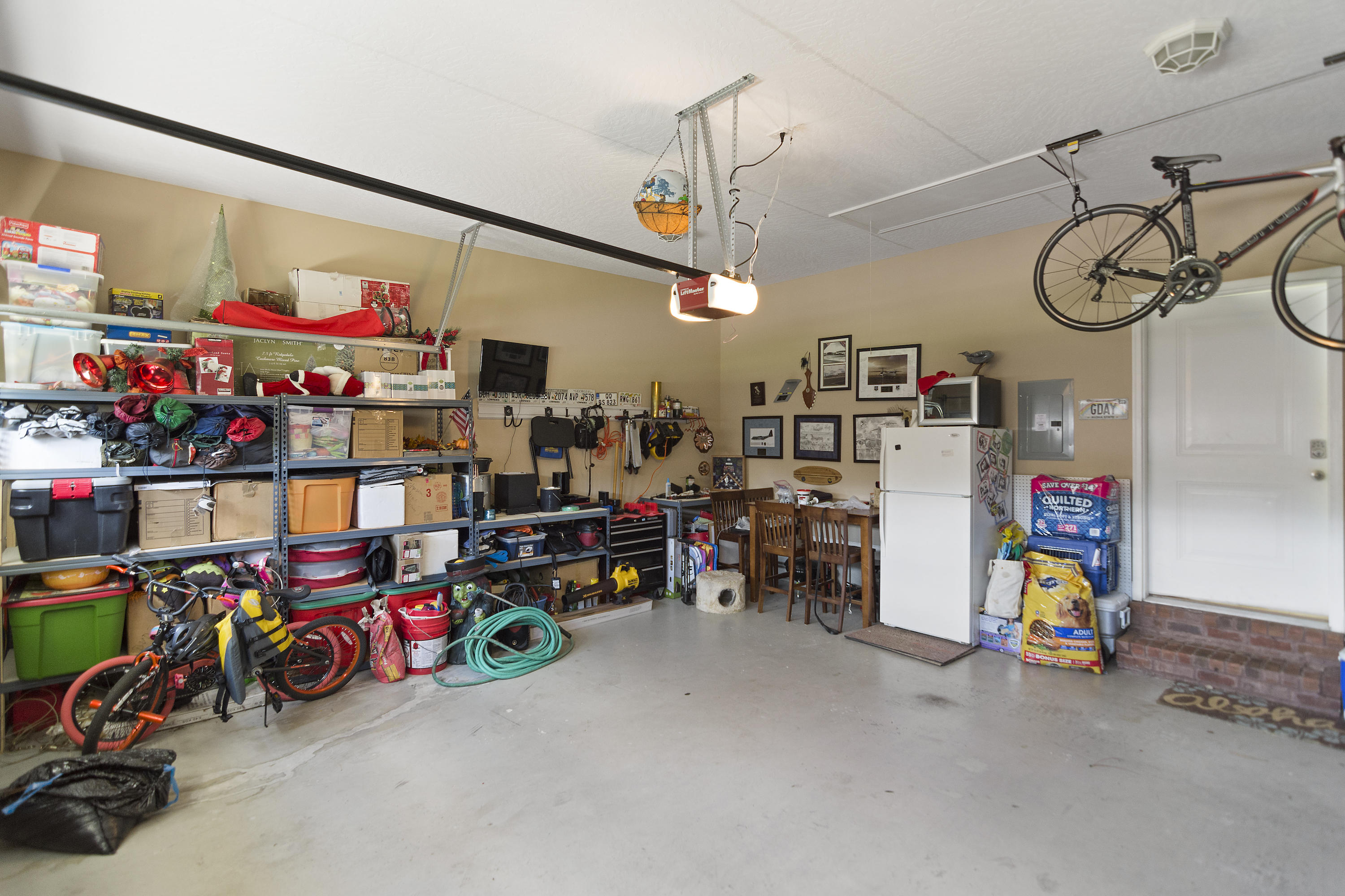 4605 Hermosa Road Crestview, FL 32539 - Photo 39 of 46 a view of a garage with a lot of stuff