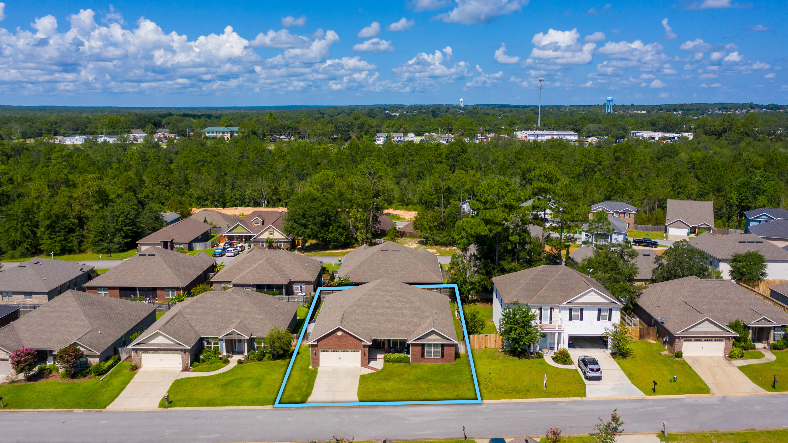 4605 Hermosa Road Crestview, FL 32539 - Photo 40 of 46 a view of multiple houses with outdoor space and a lake view