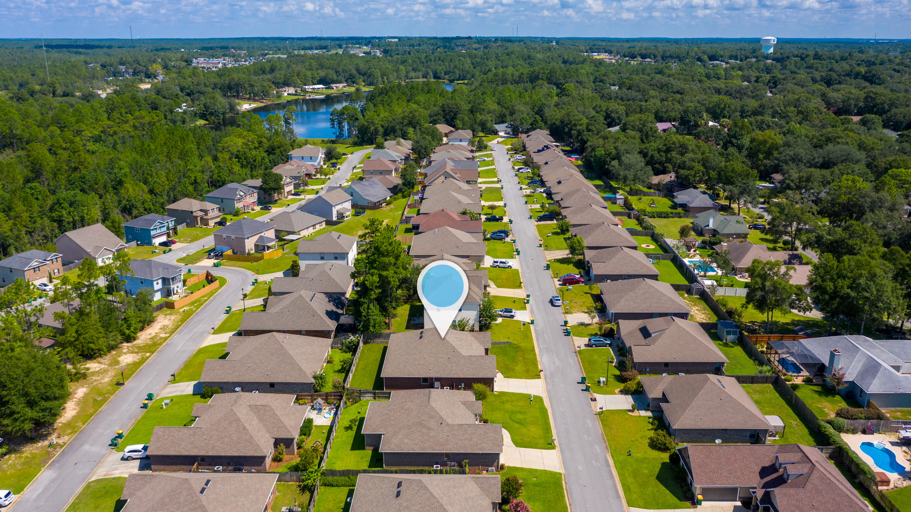 4605 Hermosa Road Crestview, FL 32539 - Photo 45 of 46 an aerial view of multiple houses with yard
