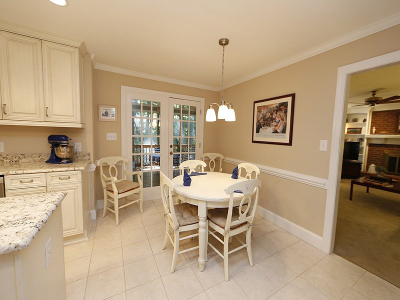 8904 Wellsley Way Raleigh, NC 27613 - Photo 11 of 25 Crown moldiing, Chair Rail, Access to 2nd Porch Breakfast Area