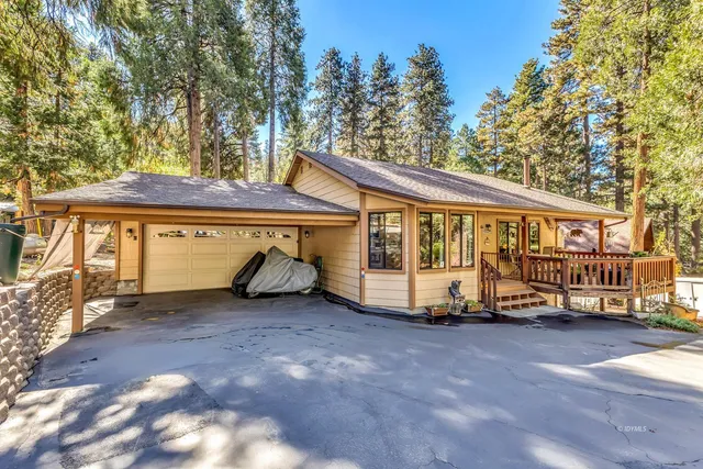a view of a entryway door front of a house