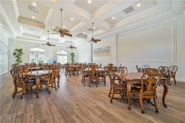 an outdoor space with furniture and wooden floor