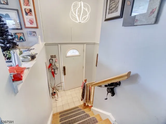 a bathroom with a small tub and shower