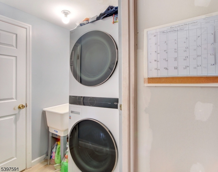 221 Chincopee Avenue Hopatcong, NJ 07843 - Photo 18 of 20 a utility room with dryer and washer