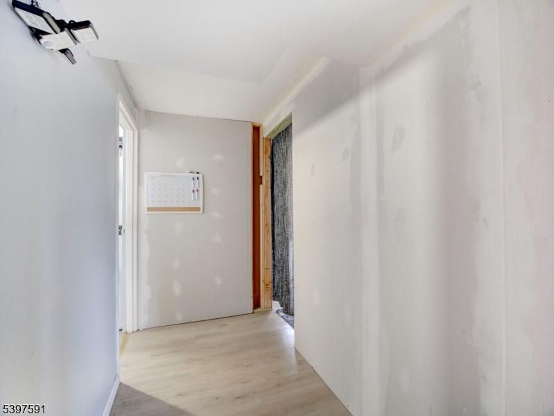 221 Chincopee Avenue Hopatcong, NJ 07843 - Photo 19 of 20 a view of a livingroom with a hardwood