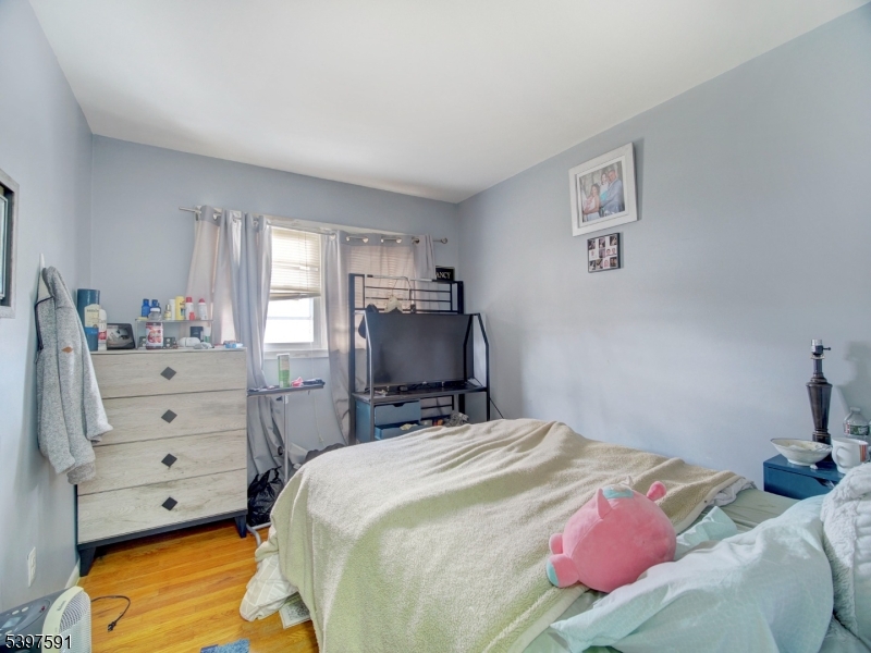 221 Chincopee Avenue Hopatcong, NJ 07843 - Photo 9 of 20 a bedroom with a bed and a closet