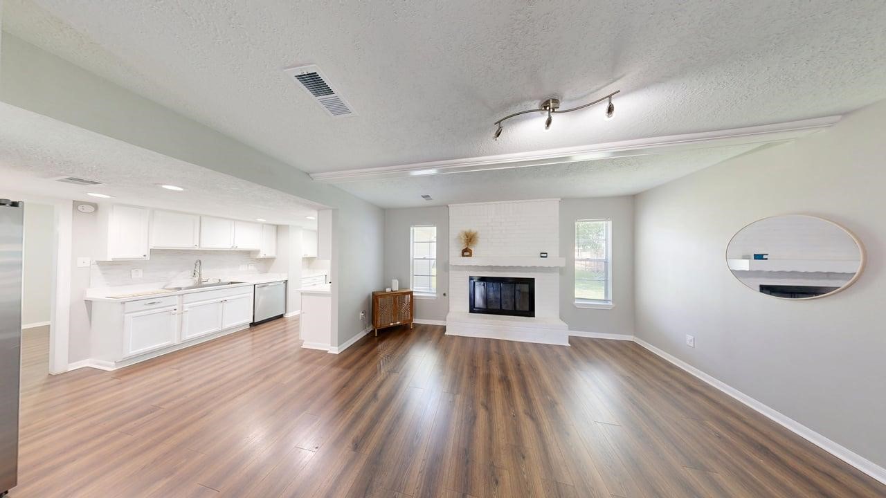 619 Cotter Drive Spring, TX 77373 - Photo 11 of 50 a view of a kitchen with wooden floor and a window