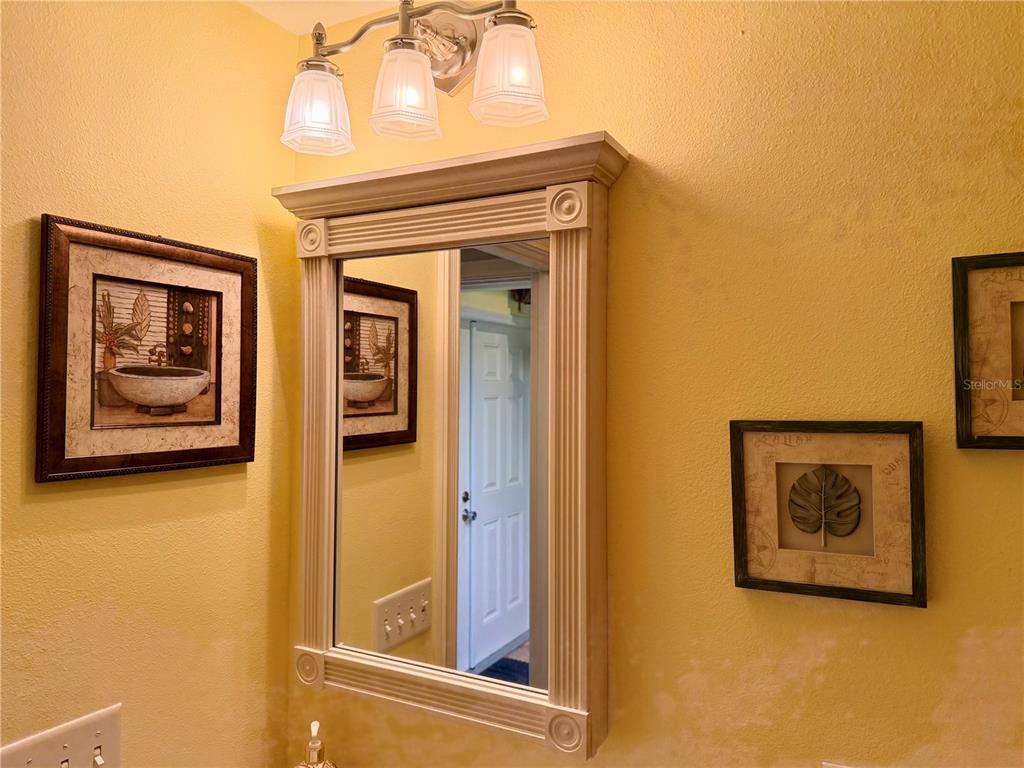 9564 Southeast 47th Way Webster, FL 33597 - Photo 22 of 40 a view of a door and chair