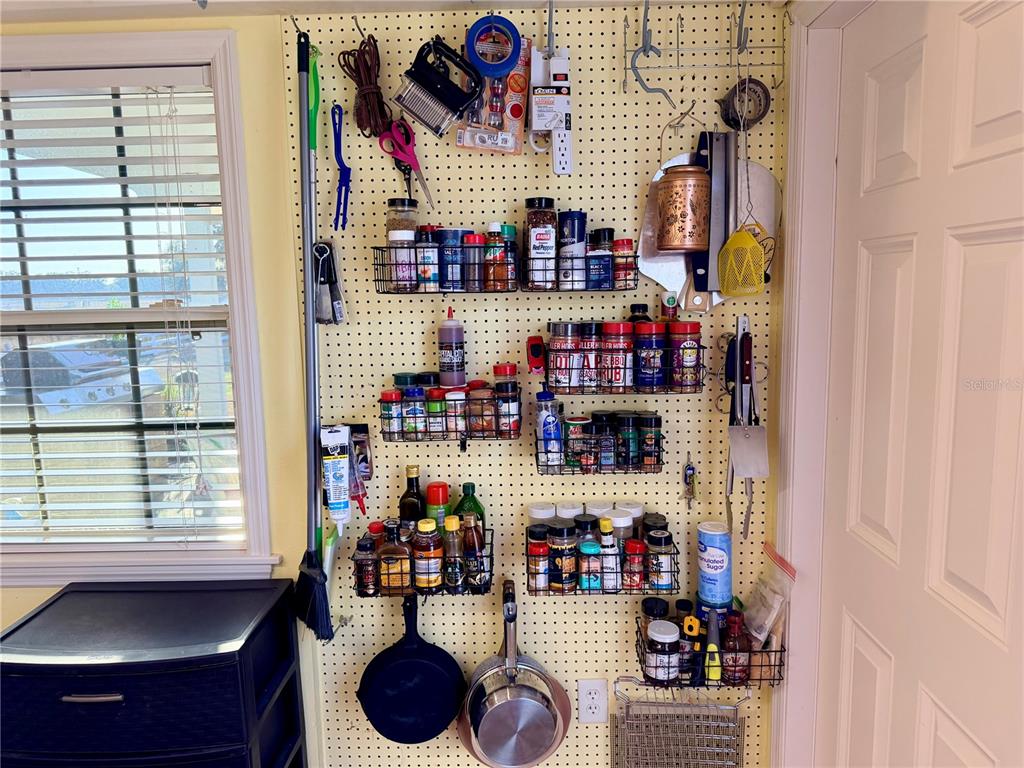 9564 Southeast 47th Way Webster, FL 33597 - Photo 24 of 40 a room with storage and utility