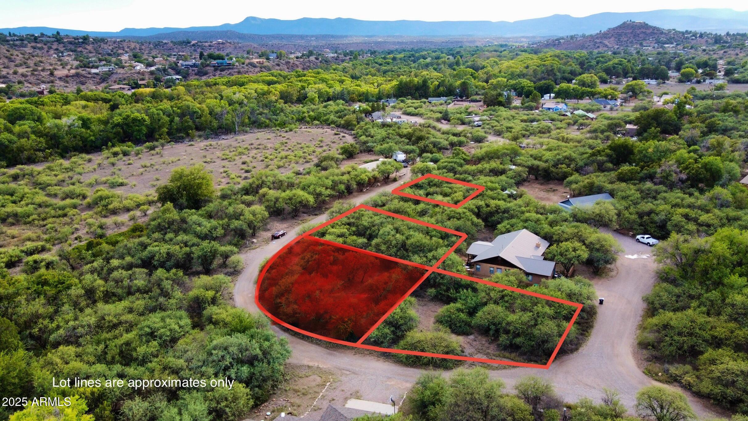 5380 North Barbara Lane, Unit 631 Rimrock, AZ 86335 - Photo 1 of 18 an aerial view of a house with yard